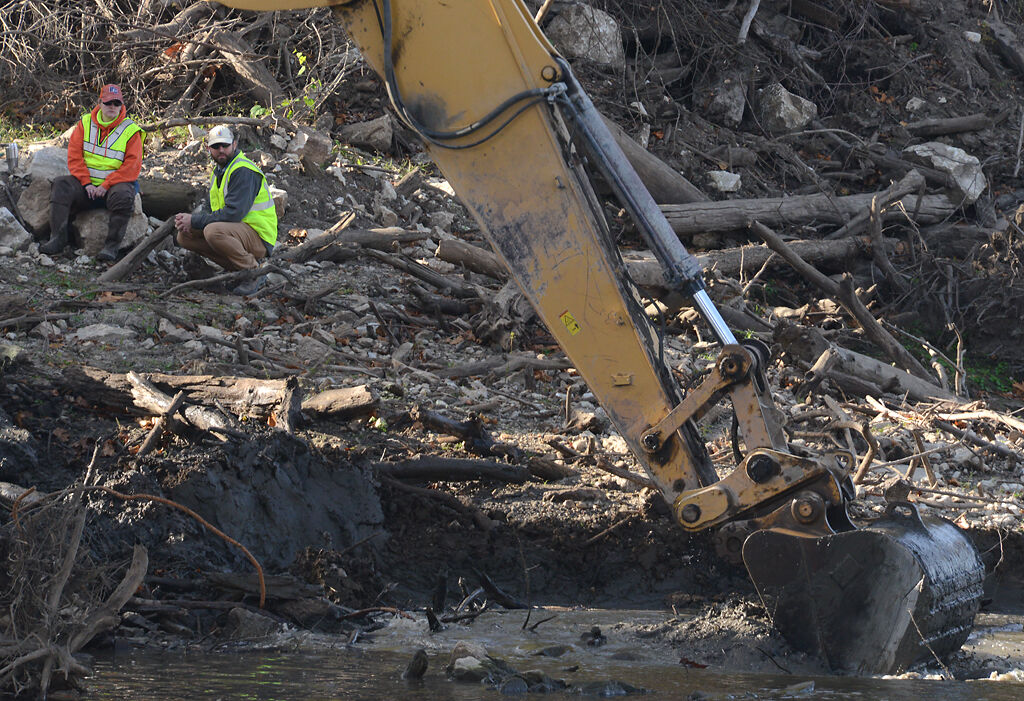 Excavation begins at the Lamine River on Wednesday in renewed search for Mengqi Ji